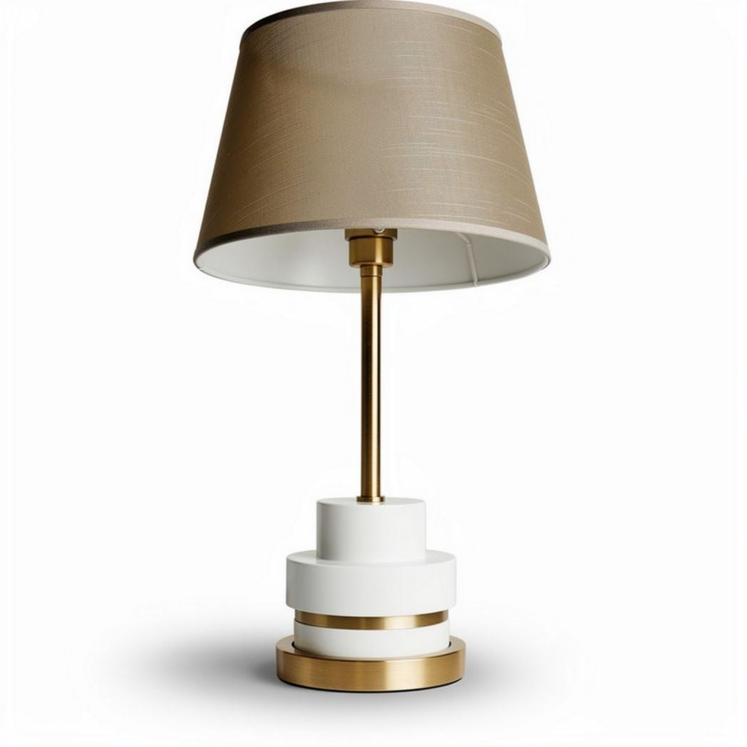 Modern table lamp with beige fabric shade gold accents and minimalist design